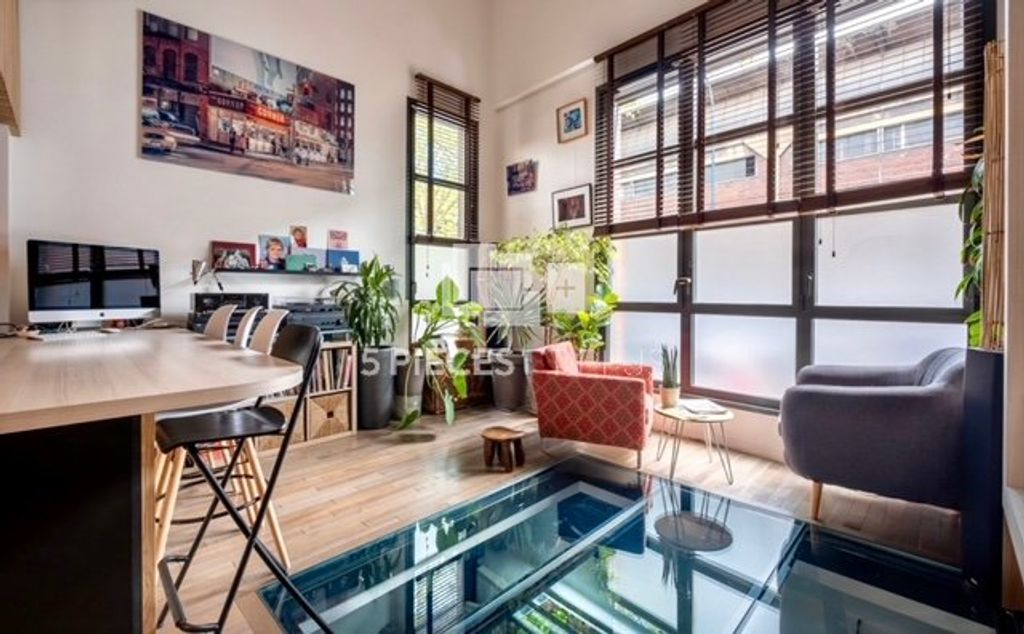 Achat loft à vendre 4 pièces 93 m² - Paris 19ème arrondissement